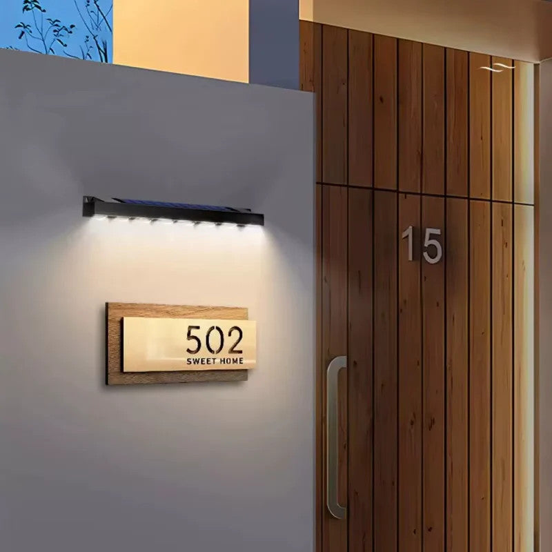 TECH ESSENTIALS — Solar Powered Wall Lamp